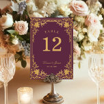Vintage Elegant Wine Colour Faux Gold Foil Wedding Table Number<br><div class="desc">This elegant wedding table number, with a vintage air, has a vintage golden frame with baroque faux gold decorations on a wine colour background. The names are written in an elegant calligraphic script. All text can be personalised and has a golden colour similar to the gold decorations of the frame....</div>