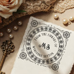 Vintage "From the Library of" Monogram Bookplate Rubber Stamp<br><div class="desc">Vintage "From the Library of" Monogram Bookplate rubber stamp. Showcasing intricate wheel patterns,  scrollwork,  your personalised monogram initials,  and name,  this Ex Libris design is perfect for adding an artistic,  vintage,  and distinctly individual touch. Ideal for creating custom bookplates.</div>