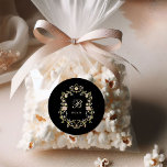 Vintage Garden Black | Colourful Wedding Monogram Classic Round Sticker<br><div class="desc">These stunning and beautiful wedding favour stickers feature an antique style,  whimsical baroque illustrated crest decorated with colourful flowers and leaves in subtle shades of peach,  pink,  purple,  green,  and neutrals on a black background. Add your monogram or initial in classic yellow cream calligraphy.</div>