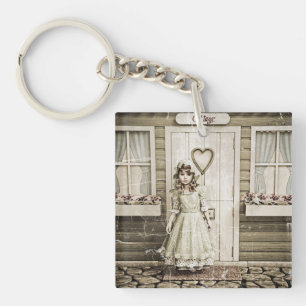 Vintage Girl standing near a Retro Cottage Key Ring