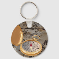 Vintage Gold Compass on Antique Pirate Map 