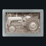 Vintage Grey massey fergison tractor Belt Buckle<br><div class="desc">The original sepia photograph of this old vintage tractor on this belt buckle was taken at the Epping forest Festival. The massey fergison grey tractor on this original buckle was used on farms many years ago. The tractor picture captures an image when farm machinery was a lot smaller than the...</div>