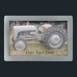Vintage Grey massey fergison tractor Rectangular Belt Buckle<br><div class="desc">The original photograph of this old vintage tractor on this belt buckle was taken at the Epping forest Festival. The massey fergison grey tractor on this original buckle was used on farms many years ago. The tractor picture captures an image when farm machinery was a lot smaller than the massive...</div>