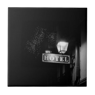 Vintage hotel sign, street light and many light ceramic tile