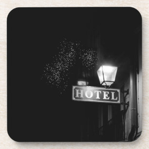 Vintage hotel sign, street light and many light coaster