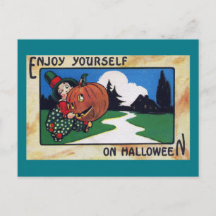 Vintage Kid Hefting Halloween Jack O'Lantern Postcard
