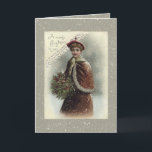 Vintage Lady in Snow with Christmas Greeting Holiday Card<br><div class="desc">Lovely Victorian lady dressed for winter in red cape holding a bouquet of holly in snow with Christmas greeting.</div>