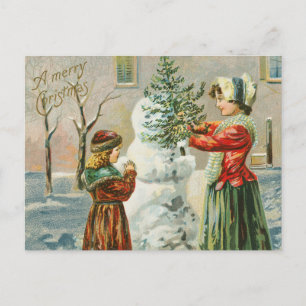 Vintage Mum and Girl Making a Snowman Holiday Postcard