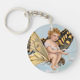 Vintage New Years card, child riding butterfly Key Ring