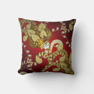 Vintage ornamental pattern on a red, yellow and b cushion