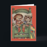 Vintage Puppy and Kitten Christmas Greeting Card<br><div class="desc">Retro / Vintage Christmas greeting card.  Adorable puppy and kitten snuggled in bed on Christmas Eve!  Merry Christmas.  Perfect for dog lovers and cat lovers!</div>