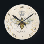 Vintage Queen Bee Royal Crown Roman Numerals Round Clock<br><div class="desc">This elegant clock with roman numerals features a vintage queen bee design of a honeybee with a royal crown on a beige background of honeycomb. Makes a unique girly gift for any occasion. Designed by artist ©Tim Coffey.</div>