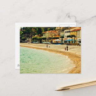 Vintage sandy seashore city sea houses and trees postcard