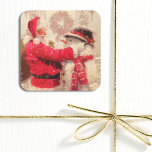 Vintage Santa Claus Snowman Christmas Square Sticker<br><div class="desc">Vintage Santa Claus Snowman Christmas Stickers and Labels features a jovial Santa Claus and snowman in the snow. Perfect for Christmas gift wrapping,  favours and gifts. Created by Evco Holidays www.zazzle.com/store/evcosholidays</div>