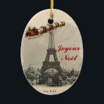 Vintage Santa over Paris Christmas Ornament<br><div class="desc">"Joyeux Noël" Merry Christmas in French, appears on this ornament with a vintage Santa and his sleigh full of toys flying past the Eiffel Tower from an antique French postcard. Personalise the back with year and/or name for a special gift or keepsake ornament for your own tree. A matching Christmas...</div>