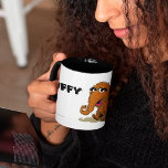 Vintage Snuffleupagus Mug<br><div class="desc">Start your day with a nostalgic smile with this vintage-style mug featuring Snuffleupagus from Sesame Street. The charming retro design showcases Snuffy in warm, earthy tones, making it a perfect gift for fans of all ages. Ideal for coffee, tea, or hot chocolate, this mug adds a touch of Sesame Street...</div>