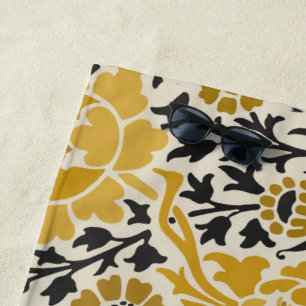 Vintage-style yellow and black floral pattern beach towel