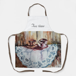 Vintage tea cups on white lace linen apron