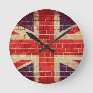 Vintage UK flag on a brick wall Round Clock