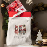 Vintage Watercolor Christmas Animals Tote Bag<br><div class="desc">Transform your holiday designs into a cosy winter wonderland with these vintage watercolor Christmas animals! These high-resolution PNG illustrations come with transparent backgrounds, making them the perfect addition to your festive projectsGet ready to infuse the holiday spirit into your products, especially if you're selling on Zazzle. Our collection features anthropomorphic...</div>