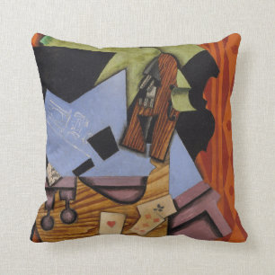 Violin and Playing Cards on a Table Cushion