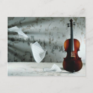 Violin with music sheets floating postcard