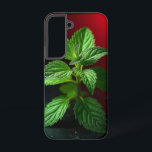 "Vivid Mint Plant Macro – Botanical Green on Black Samsung Galaxy Case<br><div class="desc">Bring a breath of freshness and nature’s elegance into your space with this vivid macro photograph of a mint plant. Captured in stunning detail, the crisp green leaves pop dramatically against a moody black background with a striking red gradient. Ideal for kitchen decor, herbal-themed gifts, botanical lovers, or anyone who...</div>