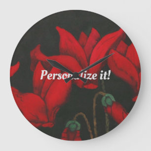 Vivid red Cyclamen on a dark black background Large Clock