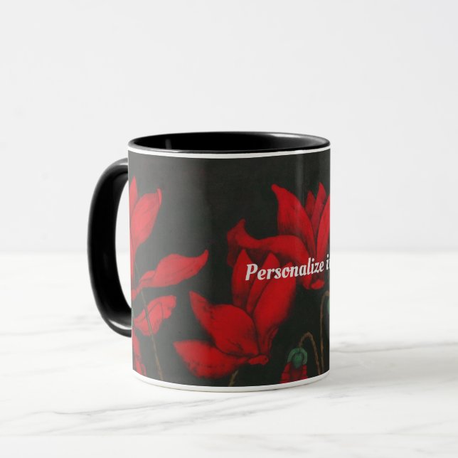 Vivid red Cyclamen on a dark black background Mug (Front Left)