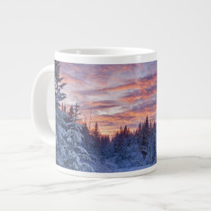 Vivid sunset paints the sky above wintery large coffee mug