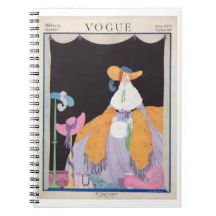 Vogue magazine cover featuring a woman in  coat notebook