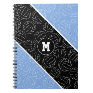 volleyballs line art pattern on light blue black notebook