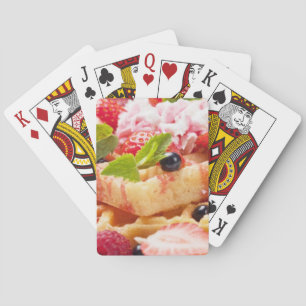 Waffle cake with fresh berry fruit playing cards
