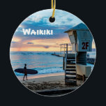 Waikiki O'ahu Ceramic Ornament<br><div class="desc">A unique gift or keepsake for the Hawaiian traveller.  A lifeguard tower at Queen's Beach at dusk on front and a growing pineapple on the back. Waikiki and the year can be changed,  if desired.</div>