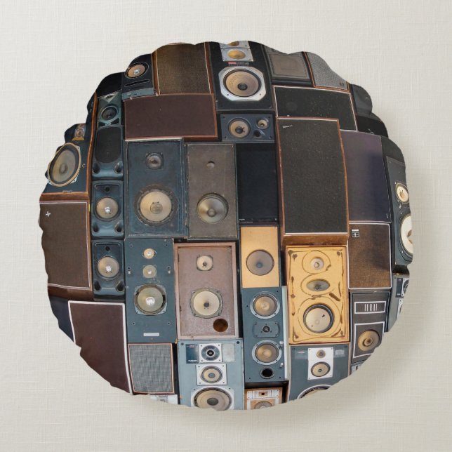 Wall of speakers round cushion (Front)
