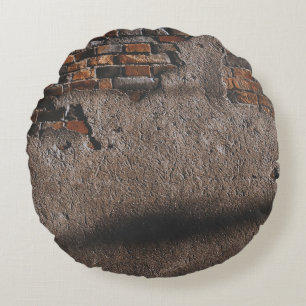 Wall with broken bricks round cushion