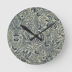 Wallpaper with navy blue seaweed style design round clock