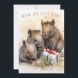 Warm and Fuzzy Wishes Wombat Christmas Card<br><div class="desc">This charming card features three cute wombats nestled by a festive Christmas present, radiating holiday joy and warmth. It's a heartwarming and whimsical way to convey your Christmas wishes. Share the spirit of the season with this delightful card that captures the essence of love, togetherness, and wombat wonder. Perfect for...</div>
