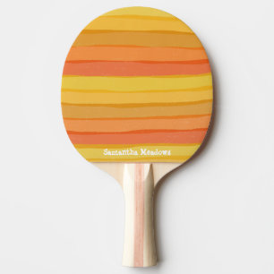 Warm orange and yellow stripey  ping pong paddle