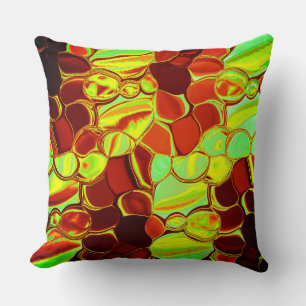 Warm rounded pieces in coral to lime green cushion