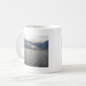 Warm sea sunset with cargo ship at the horizon coffee mug (Front Left)