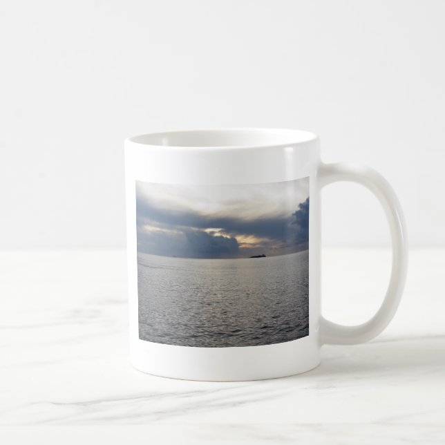 Warm sea sunset with cargo ship at the horizon coffee mug (Right)