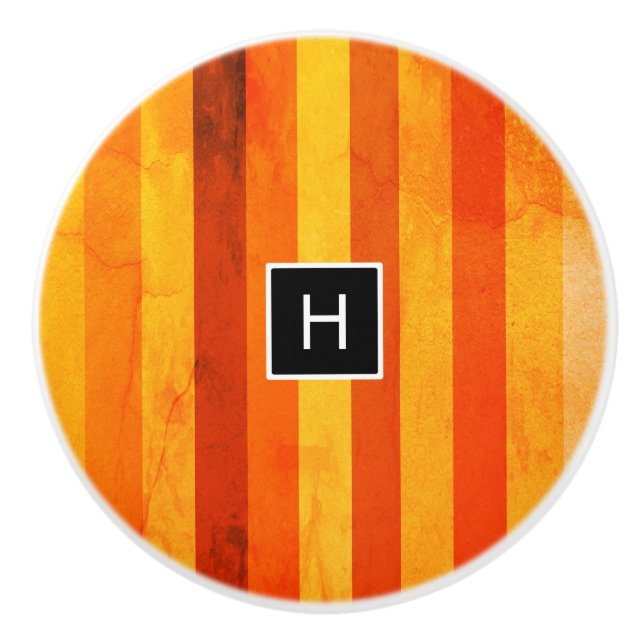 Warm Weathered Orange Red Stripes Monogram Ceramic Knob (Front)