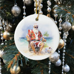 Warmest Wishes Santa at the Beach Ceramic Ornament<br><div class="desc">This design was created though digital art. It may be personalised in the area provided by changing the photo and/or text. Or it can be customised by choosing the click to customise further option and delete or change the colour the background, add text, change the text colour or style, or...</div>
