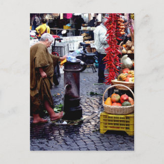 washing feet in market postcard