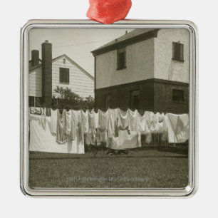 Washing line outside houses metal tree decoration