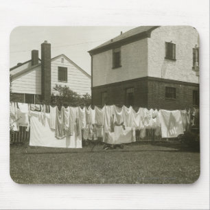 Washing line outside houses mouse pad