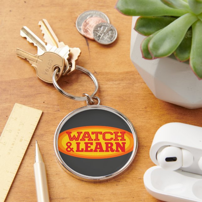 Watch & Learn Radial Oval Key Ring (Desk)