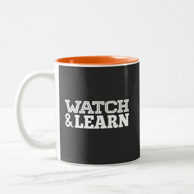 Watch & Learn White Text Two-Tone Coffee Mug (Left)