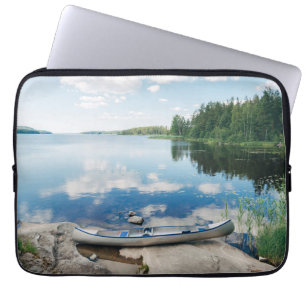 Water   Canoe on Lake in Sweden Laptop Sleeve